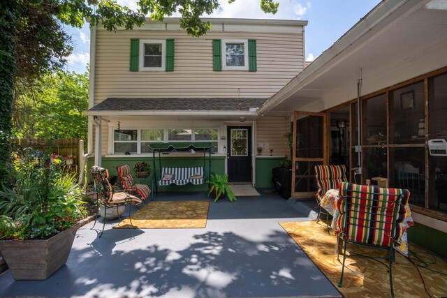 back of property with a patio area