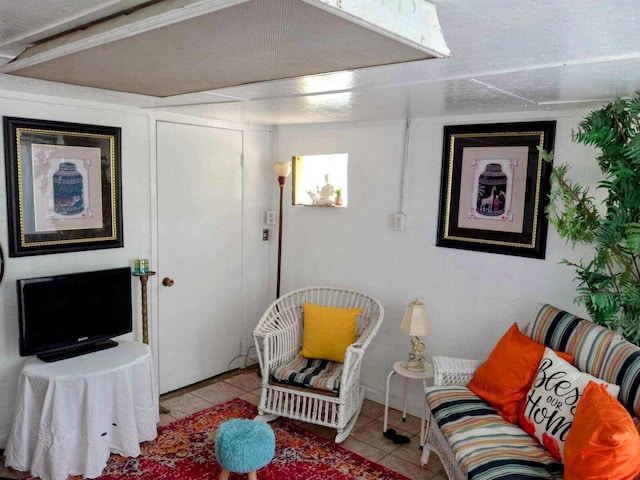 living area with light tile patterned floors