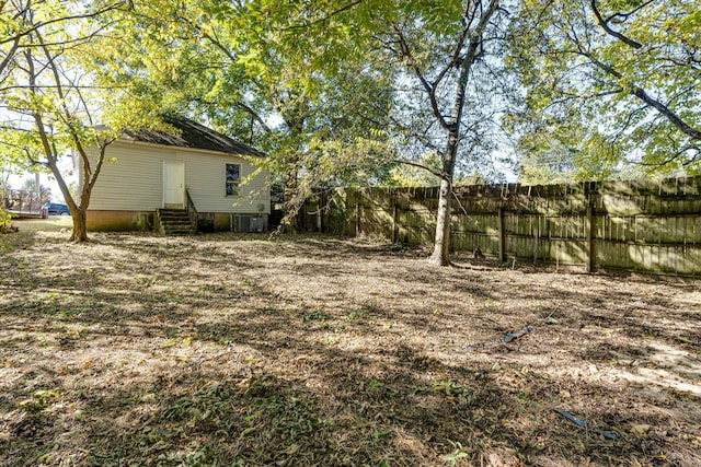 view of yard featuring central AC