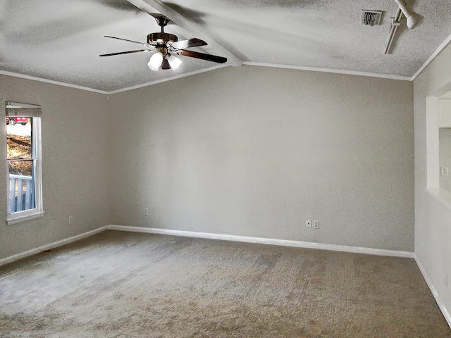 carpeted spare room with ornamental molding, vaulted ceiling, a textured ceiling, and ceiling fan