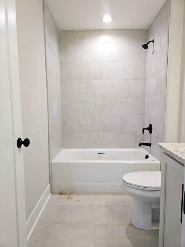 full bathroom with vanity, toilet, and tiled shower / bath combo