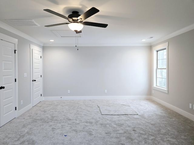 unfurnished room featuring carpet flooring, crown molding, and ceiling fan