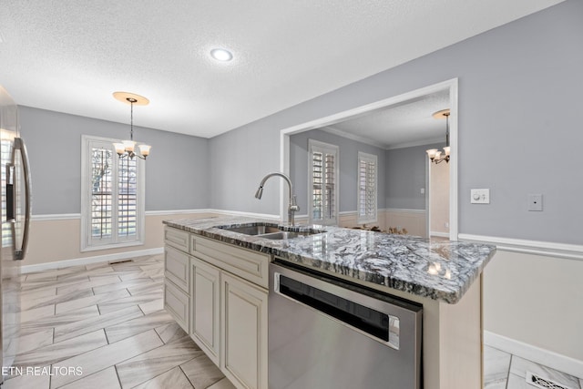 kitchen with sink, an island with sink, stainless steel dishwasher, and a notable chandelier