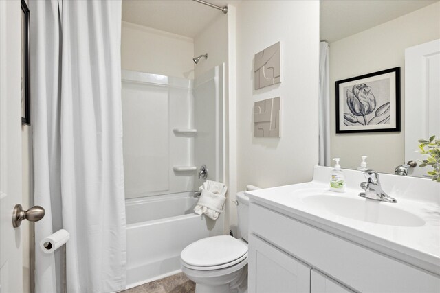 full bathroom featuring shower / bath combination with curtain, toilet, and vanity