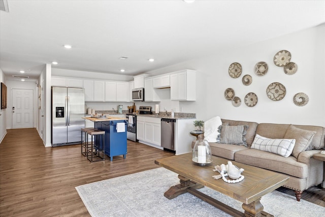 living room with hardwood / wood-style floors