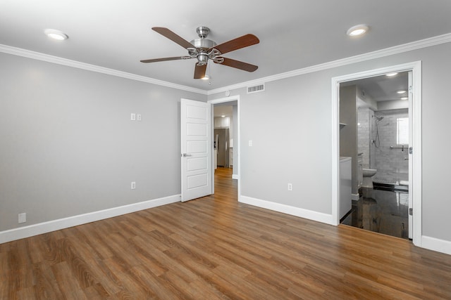 unfurnished bedroom with ceiling fan, hardwood / wood-style flooring, ensuite bathroom, and ornamental molding