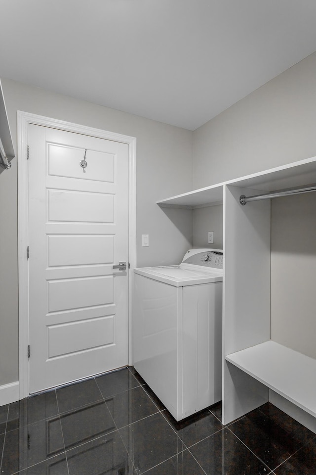 laundry room featuring laundry area and washer / clothes dryer