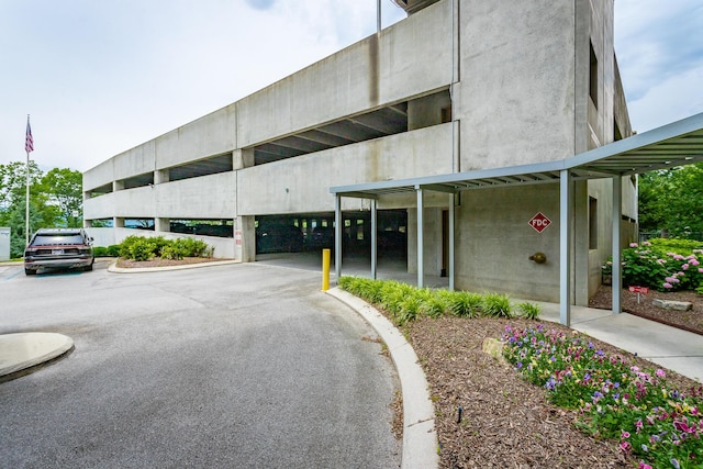 view of property with uncovered parking