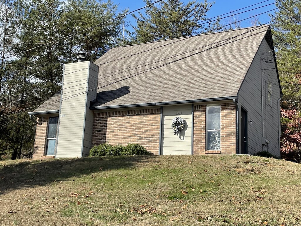 exterior space with a front lawn