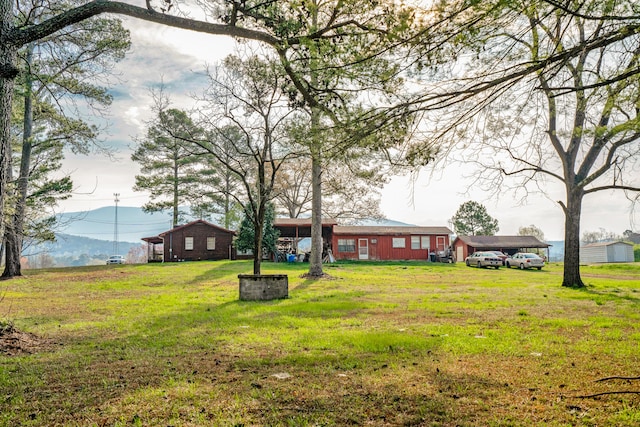 view of yard featuring a carport