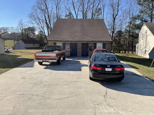 exterior space featuring a front lawn