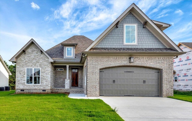 view of front of home with a front yard, an attached garage, concrete driveway, crawl space, and brick siding