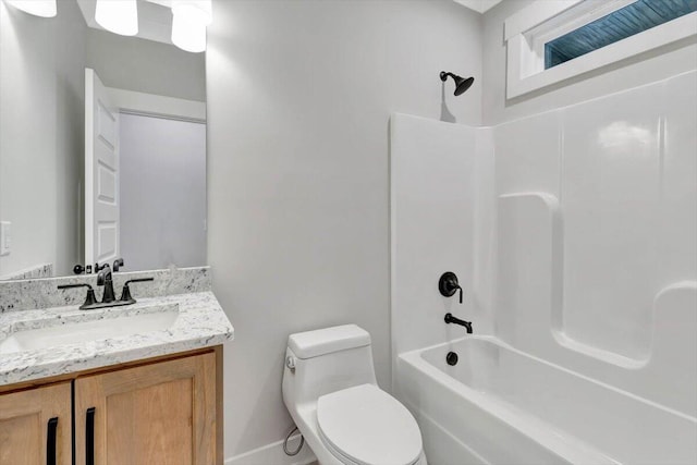 full bathroom featuring vanity, toilet, and bathing tub / shower combination