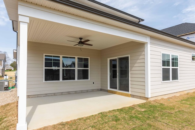 view of patio / terrace with ceiling fan and central AC