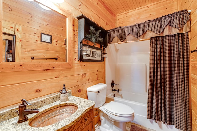 full bathroom featuring wooden walls, wooden ceiling, shower / bath combo, toilet, and vanity