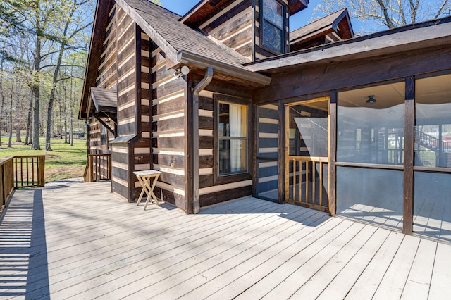 deck featuring a sunroom