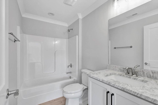 full bath with visible vents, toilet, wood finished floors, washtub / shower combination, and crown molding