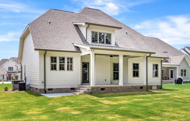 rear view of house featuring a yard, roof with shingles, and crawl space