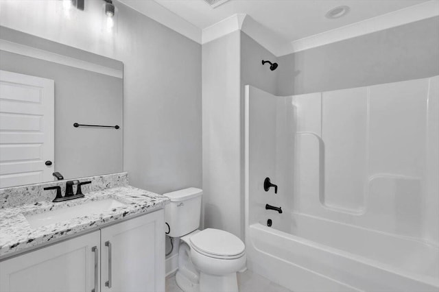 bathroom with tub / shower combination, toilet, and vanity