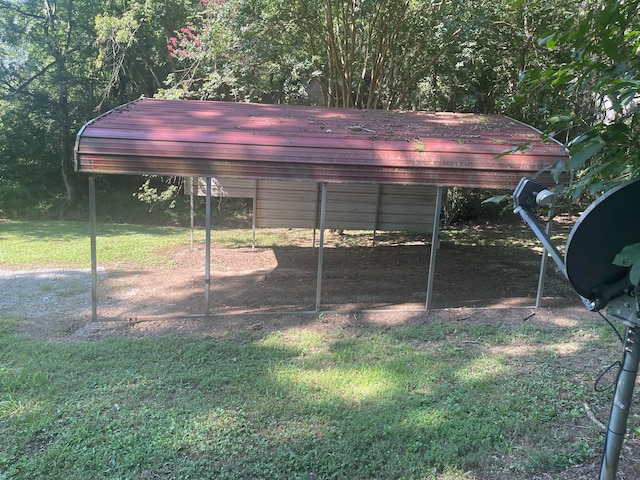 exterior space featuring a lawn and a carport