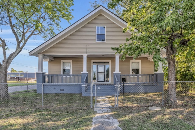 bungalow with a front lawn and a porch