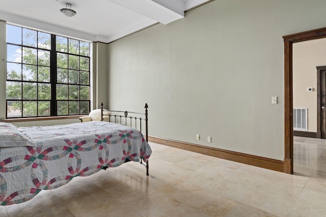 bedroom with tile patterned floors