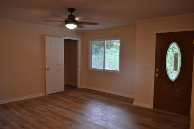 entryway featuring ceiling fan and dark hardwood / wood-style floors