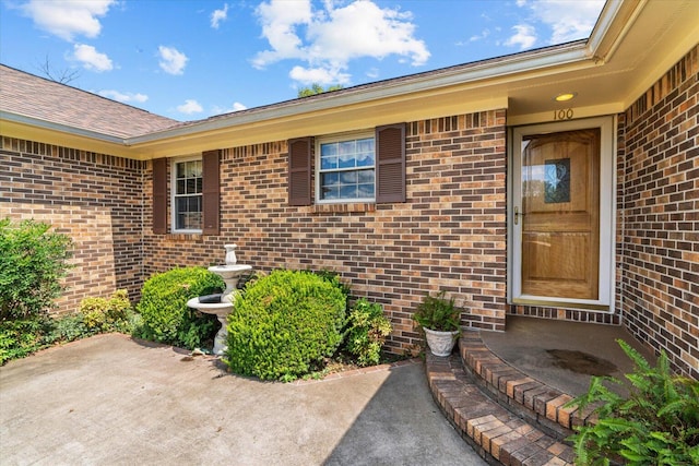 doorway to property featuring a patio