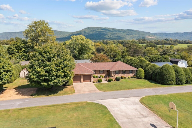 exterior space featuring a mountain view