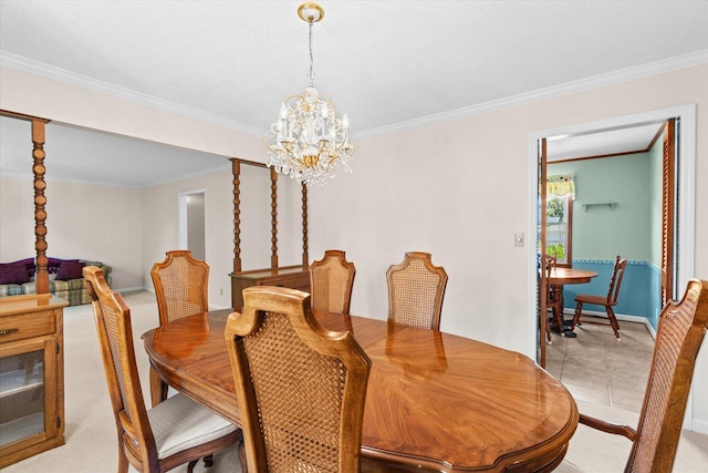 tiled dining area featuring crown molding and an inviting chandelier