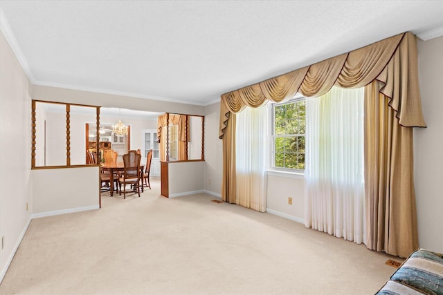 interior space featuring a textured ceiling and crown molding