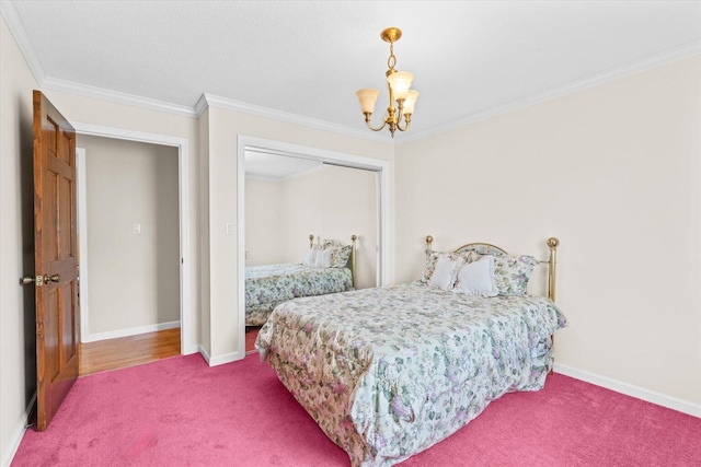 carpeted bedroom with a closet, an inviting chandelier, and ornamental molding