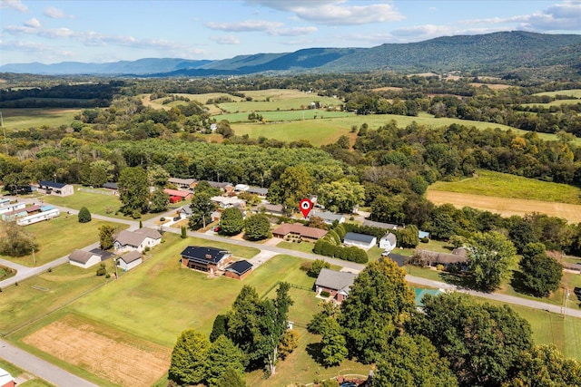 drone / aerial view featuring a mountain view