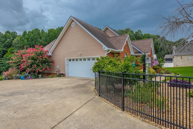 view of side of property featuring a garage