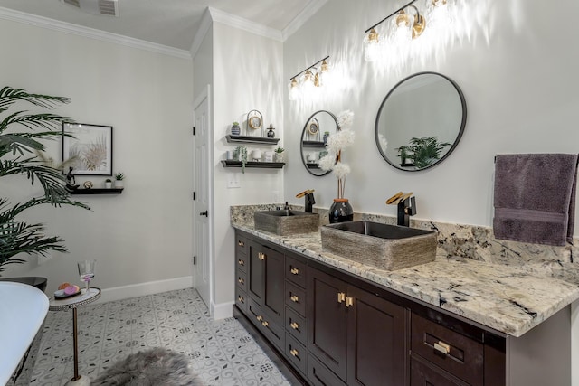 bathroom featuring tile patterned floors, vanity, and ornamental molding