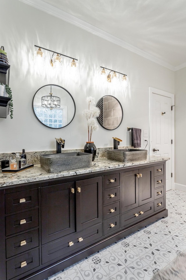 bathroom with vanity, tile patterned floors, and ornamental molding