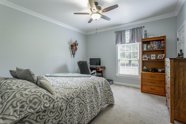 carpeted bedroom featuring ceiling fan, ornamental molding, and multiple windows