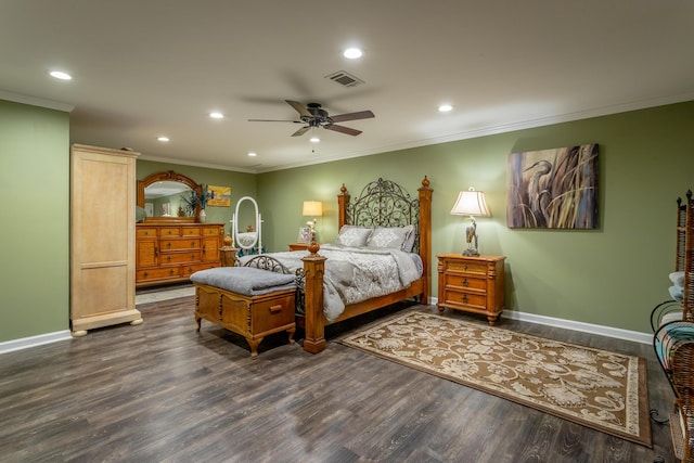 bedroom featuring dark hardwood / wood-style flooring, ceiling fan, and crown molding