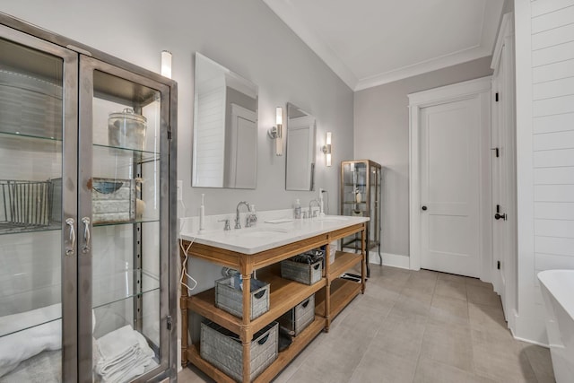 bathroom featuring crown molding, vanity, plus walk in shower, and tile patterned floors