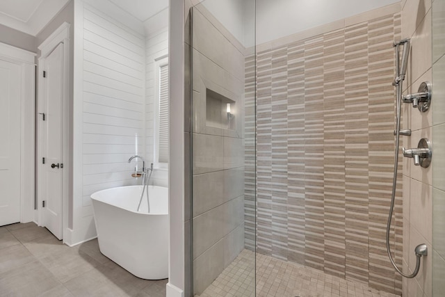 bathroom featuring separate shower and tub