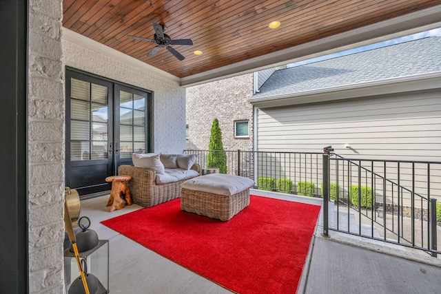 view of patio with french doors and ceiling fan