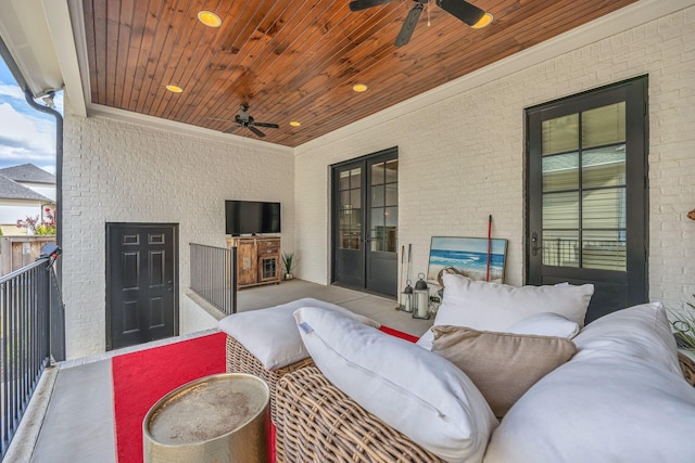 view of patio featuring ceiling fan