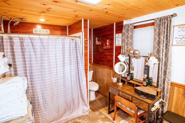 bathroom featuring toilet, hardwood / wood-style floors, curtained shower, wood walls, and wood ceiling