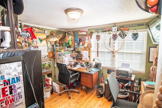 office area featuring a textured ceiling, crown molding, and hardwood / wood-style flooring