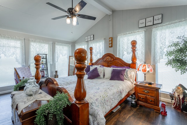 bedroom with dark wood-type flooring, vaulted ceiling with beams, and multiple windows