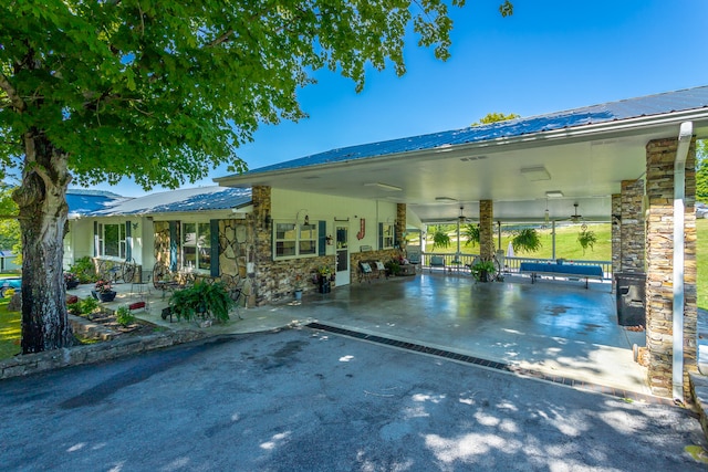 view of property's community featuring a patio area