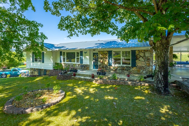 single story home featuring a front yard and a porch