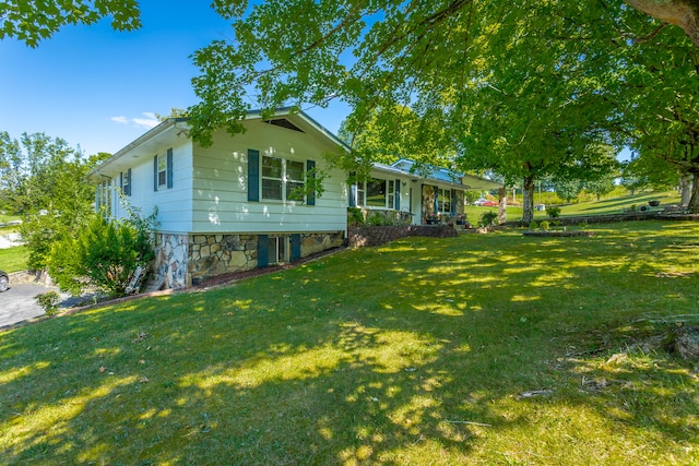 view of front of house with a front yard