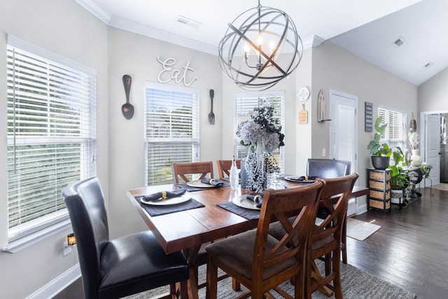 dining space featuring lofted ceiling, dark hardwood / wood-style floors, a notable chandelier, and ornamental molding