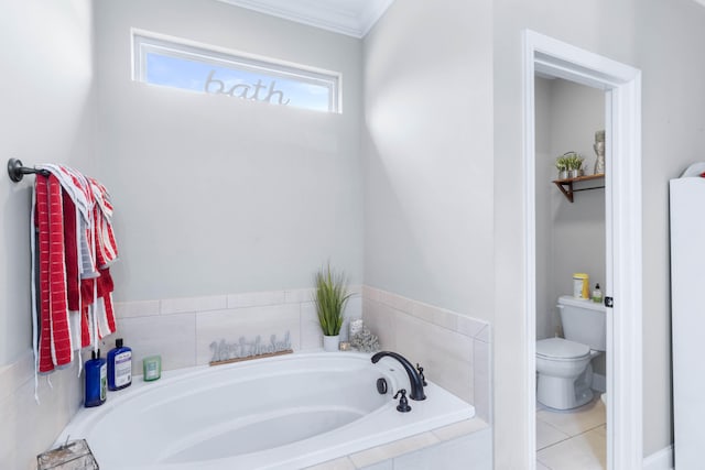 bathroom featuring crown molding, toilet, tile patterned floors, and tiled bath